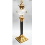 An early 20th century corinthian column oil lamp, converted for electricity, total height 67 cm