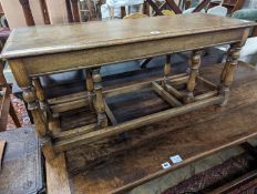 A nest of 18th century oak occasional tables, width 101cm, depth 38cm, height 46cm