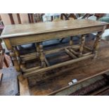 A nest of 18th century oak occasional tables, width 101cm, depth 38cm, height 46cm