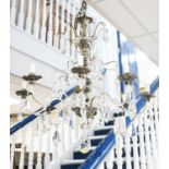 A silvered and crystal eight branch chandelier, approx. height 79cm