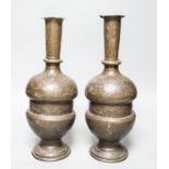 A pair of Persian engraved vases 32cm