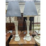 A pair of painted wood figural table lamps, height excluding shades 76cm