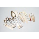 Five assorted silver bookmarks, a white metal cased toothpick, spoons etc.