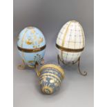 Two silver gilt mounted enamelled eggs with interior seascapes, on silver gilt stands, Birmingham,