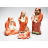 Four Chinese or Japanese porcelain figures of Luohan 25cm