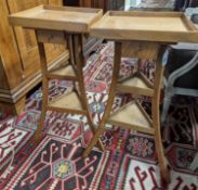 A pair of 1950's French design fruitwood square top three tier occasional tables, width 31cm