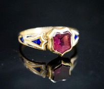 A Victorian two coloured enamel, yellow metal and foiled garnet signet ring, size M,gross 2.4g.