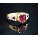 A Victorian two coloured enamel, yellow metal and foiled garnet signet ring, size M,gross 2.4g.