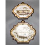 A pair of 19th century painted faience plaques in the style of Veuve Perrin 23cm