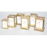 Six assorted carriage timepieces, one with alarm