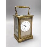 A French brass repeating carriage clock with key. 13.5cm