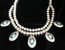 A 20th century South American? white metal and turquoise set drop necklace, approx. 44cm, gross