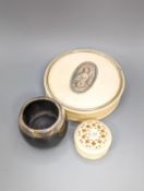 An early 19th century ivory circular box with central cartouche, a tortoiseshell match holder,