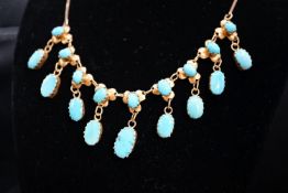 A 9k yellow metal and turquoise set drop fringe necklace, 43cm, gross 11.9 grams.