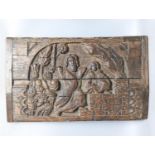 A 17th century style sunken-carved oak panel 37x61cm