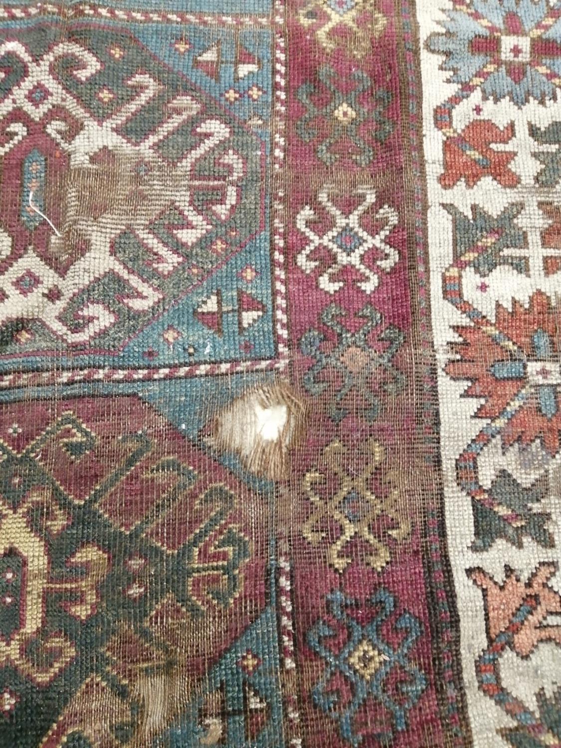 An antique Kazak rug, 310 x 150cm - Image 3 of 7