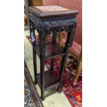 A Chinese carved hardwood three tier jardiniere stand, marble inset, width 22cm, depth 22cm,