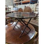 An early 20th century mahogany coaching table, diameter 92cm, height 62cm