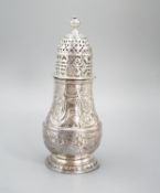 A George I silver sugar caster, with later? embossed decoration, Charles Adam, London, 1716, 13.5cm,