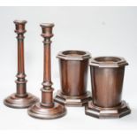 A pair of Victorian fluted mahogany candlesticks and a pair of mahogany spill vases 29cm