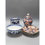 A 19th century Chinese porcelain bowl, transfer printed pillow, a Japanese Imari jar and cover and