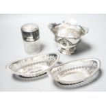 A pair of Edwardian silver oval bon bon dishes, a George V silver sugar bowl and a silver mounted