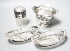 A pair of Edwardian silver oval bon bon dishes, a George V silver sugar bowl and a silver mounted
