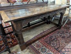 A 17th century rectangular oak refectory dining table, length 167cm, depth 74cm, height 76cm