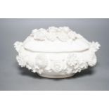 A Coalbrookdale by Coalport white glazed porcelain floral encrusted bowl and cover 23cm