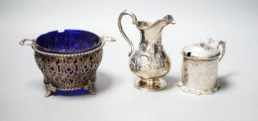 A Victorian silver cream jug, London, 1851, a Victorian silver mustard and a 1930's pierced silver