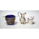 A Victorian silver cream jug, London, 1851, a Victorian silver mustard and a 1930's pierced silver