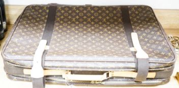 A Louis Vuitton monogram Satellite 70 suitcase initialled ‘E.F.B’ 70x50cm