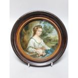 A 19th century circular reverse painting on glass, 'Lady holding roses', framed 19cm incl frame
