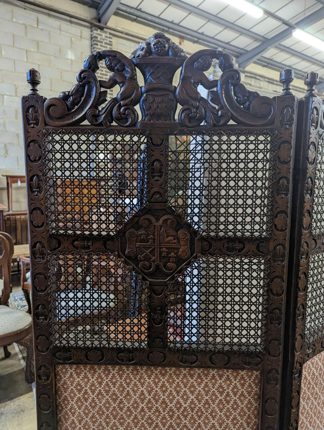 A 1920's carolean style oak and cane work two fold dressing screen, each panel width 60cm, height - Image 2 of 4