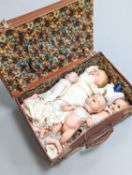 A 19th century German bisque-headed doll and three composition dolls