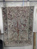 An Ispahan part silk tree of life ivory ground rug, 106 x 150cm REPORT