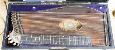 A cased J.Haslwanter guitar zither