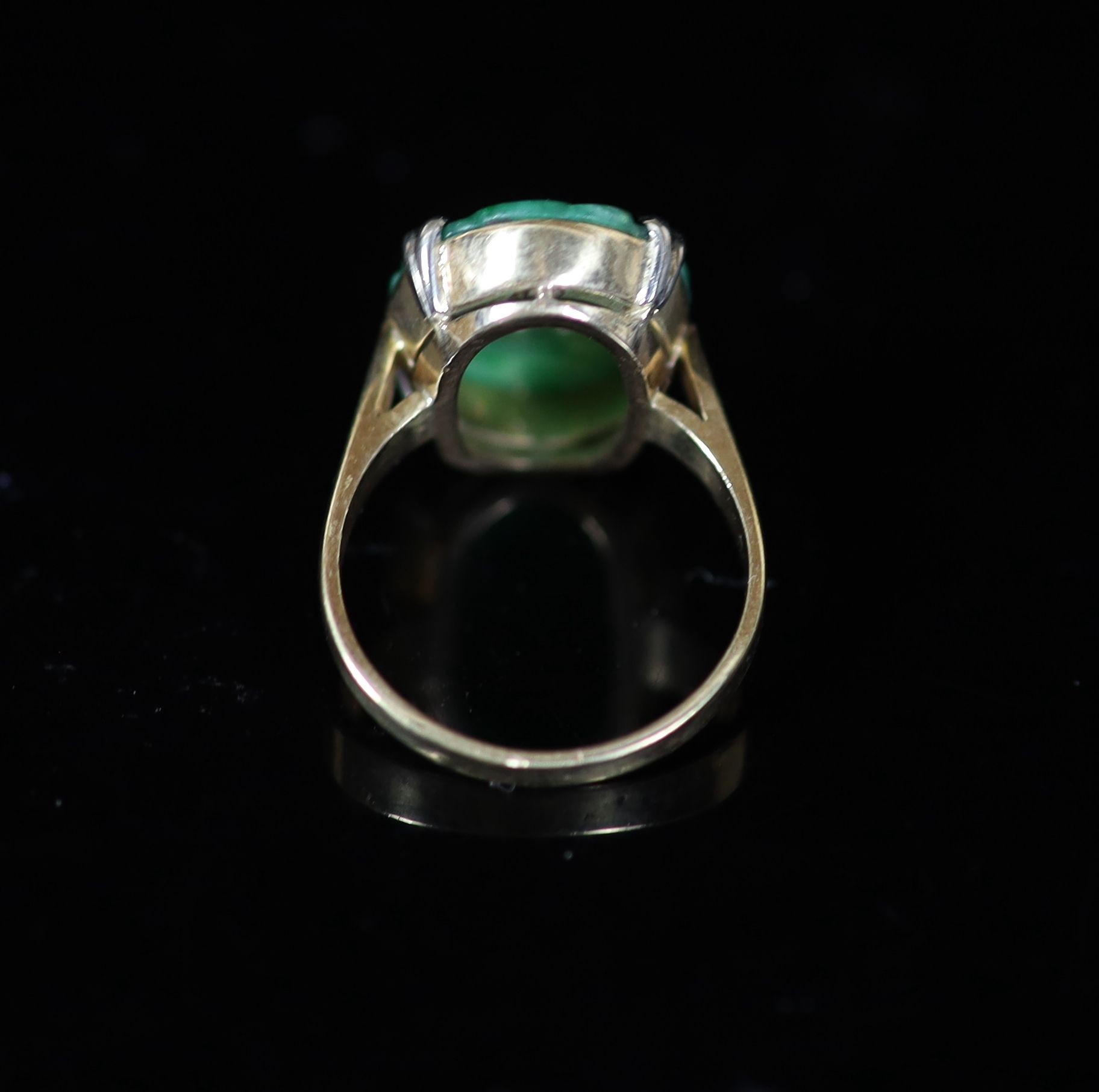 A mid 20th century gold and carved oval jade set dress ring,size O, gross 5.9 grams. - Image 4 of 4