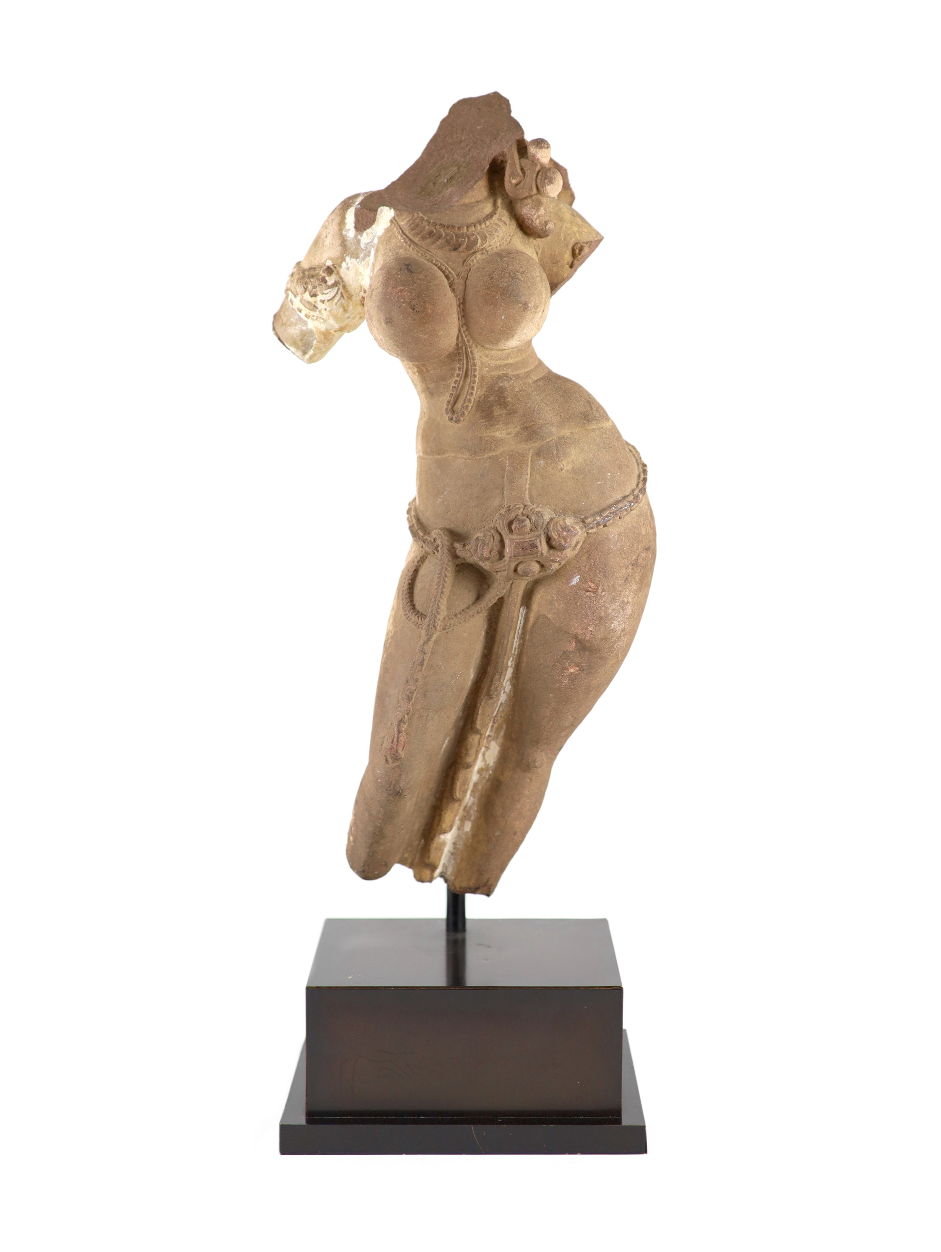 A Central Indian red sandstone torso of a Goddess, Madhya Pradesh, 10th/11th century,the torso