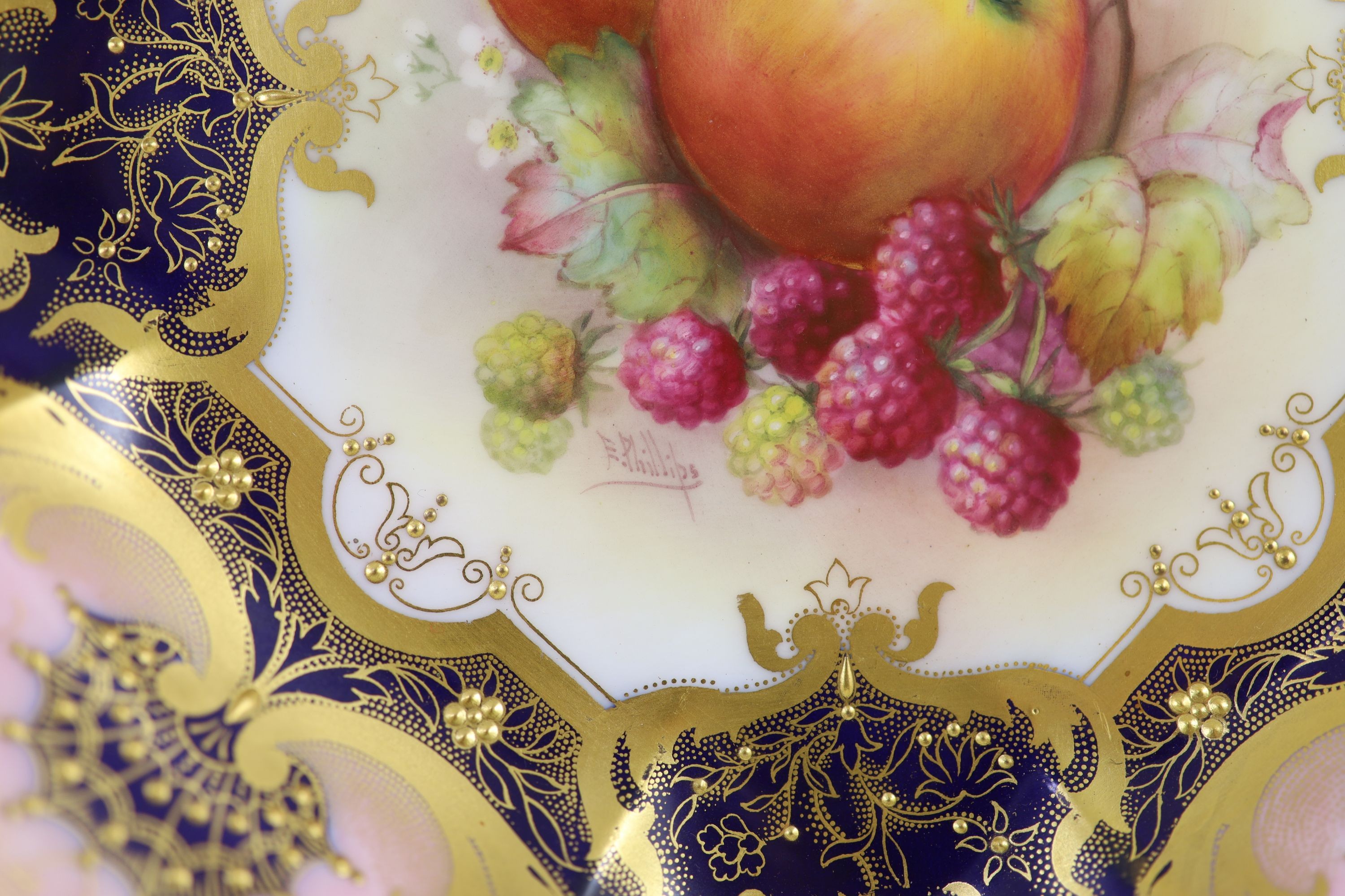 Two Royal Worcester fruit painted dessert dishes, signed E. Phillips, c.1918,each within gilt- - Image 2 of 4