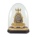 A 19th century French ormolu and Sevres style porcelain mantel clockof architectural form with urn