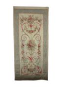 A large 19th century Aubusson entre fenetre tapestry wall panel,woven with a vase of flowers