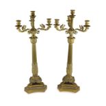 A pair of 19th century French Empire style ormolu candelabrawith acanthus scroll branches, tapered