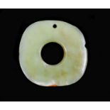 A Chinese yellow jade bi disc, possibly Hongshan Culture,with a small russet inclusion to one edge,