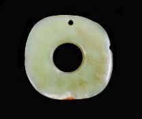 A Chinese yellow jade bi disc, possibly Hongshan Culture,with a small russet inclusion to one edge,