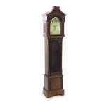 A late Victorian mahogany chiming longcase clock,with gilt brass fretwork and scroll engraved