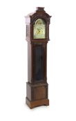 A late Victorian mahogany chiming longcase clock,with gilt brass fretwork and scroll engraved