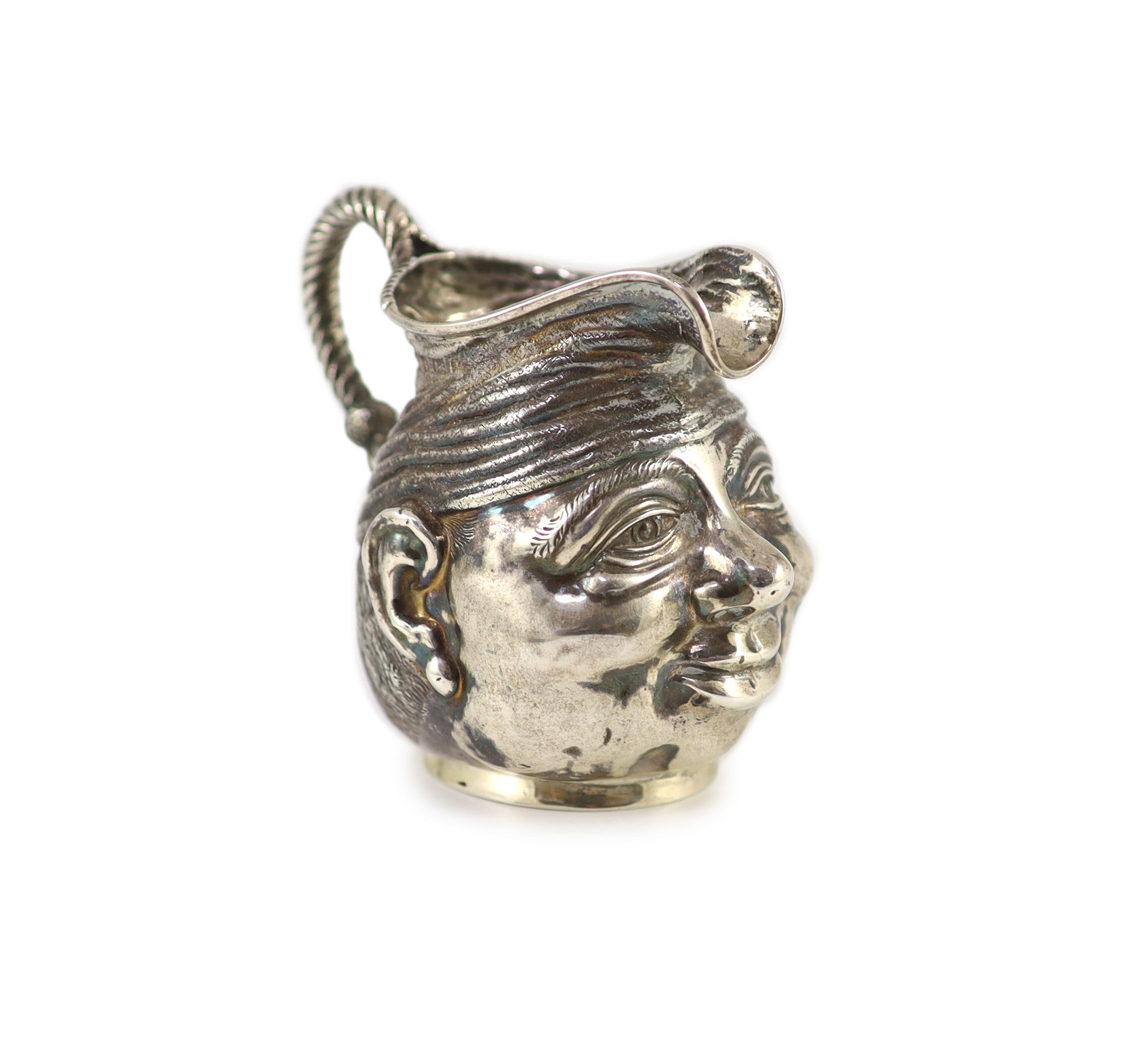 An Edwardian novelty silver cream jug, modelled as a gentleman's head with turban?, Williams,