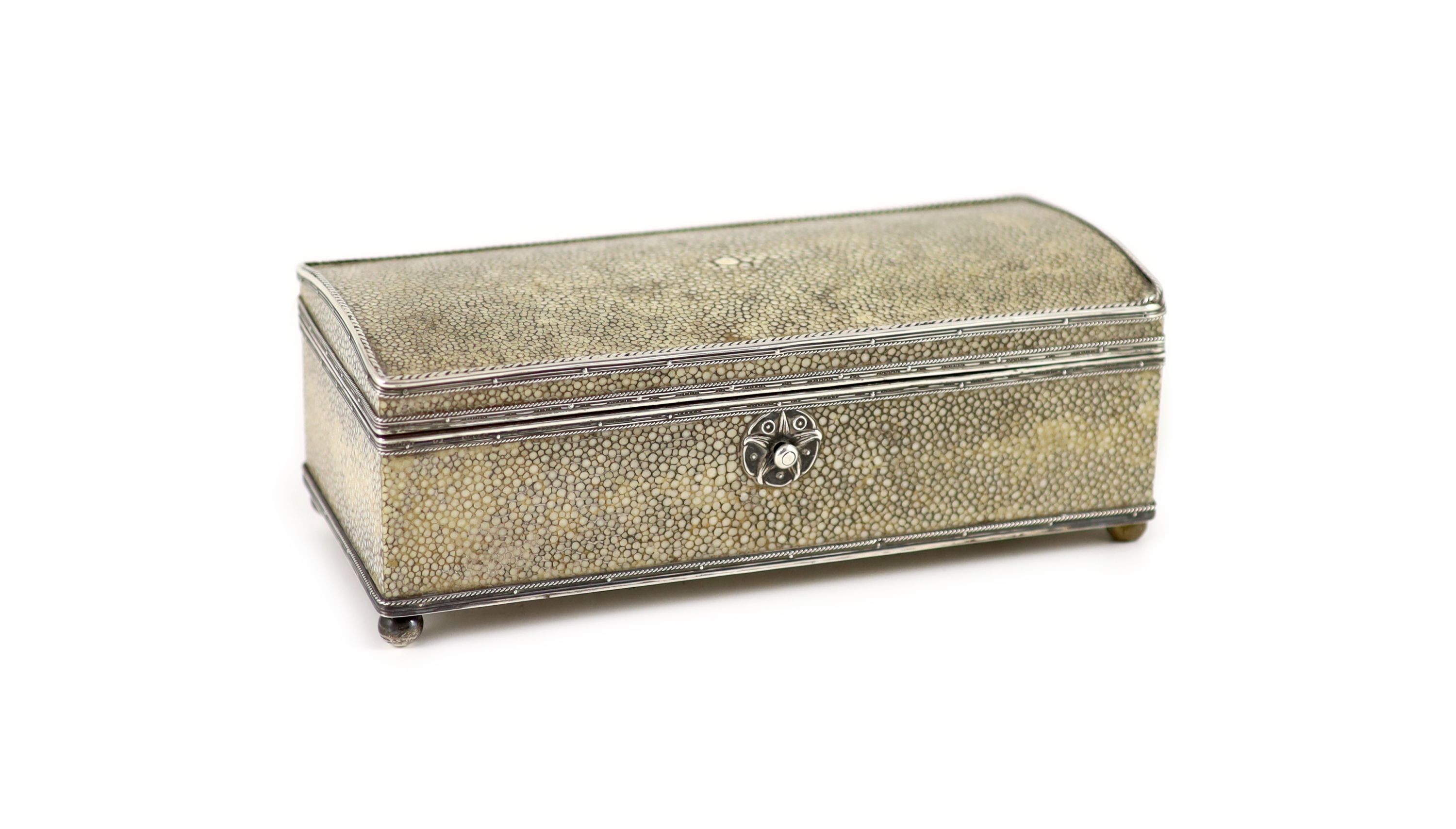 An Arts and Crafts silver mounted shagreen rectangular cigarette box, by John Paul Cooper,on ball