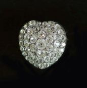 A Victorian gold, silver and pave set old mine cut diamond heart shaped brooch,the largest stone